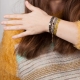Bracelet tresse fils de soie gris clair et chaîne plaqué or