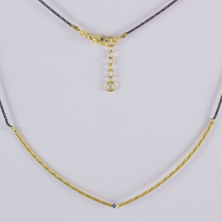 Collier semi-rigide plaqué or et diamant bleu